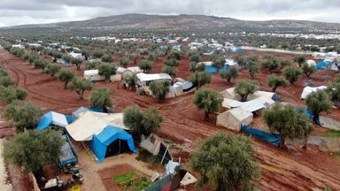 Tents housing displaced Syrians near the Syrian-Turkish border